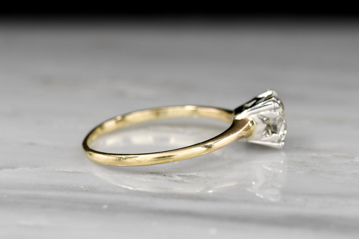 c. 1940s Midcentury Gold and Platinum Solitaire Engagement Ring with a 1.05 Carat Transitional Cut Diamond