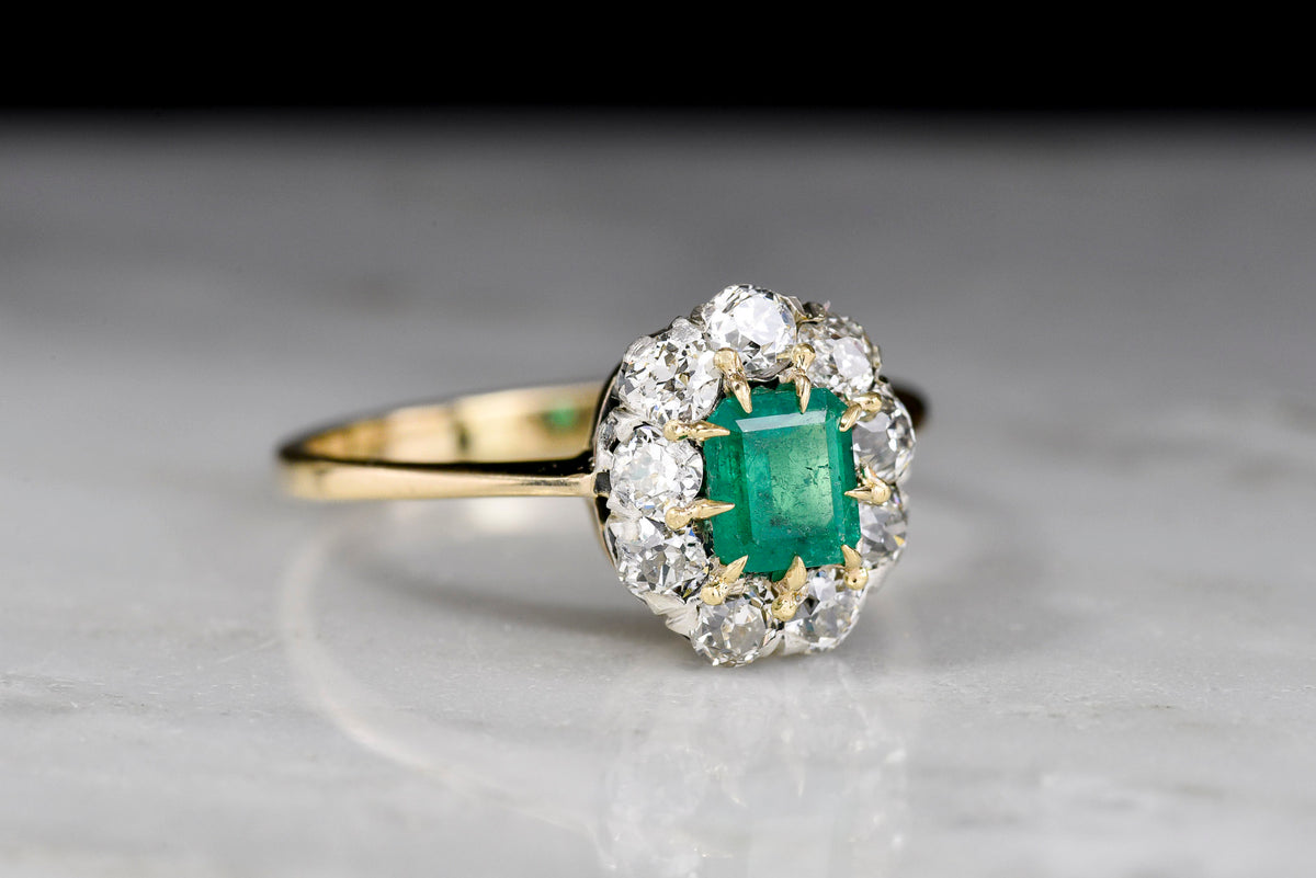 Mid-Late 1800s Victorian Cluster Ring with Antique Cut Diamonds and an Emerald Center
