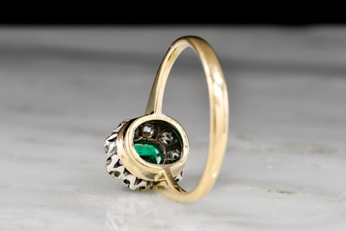 Mid-Late 1800s Victorian Cluster Ring with Antique Cut Diamonds and an Emerald Center