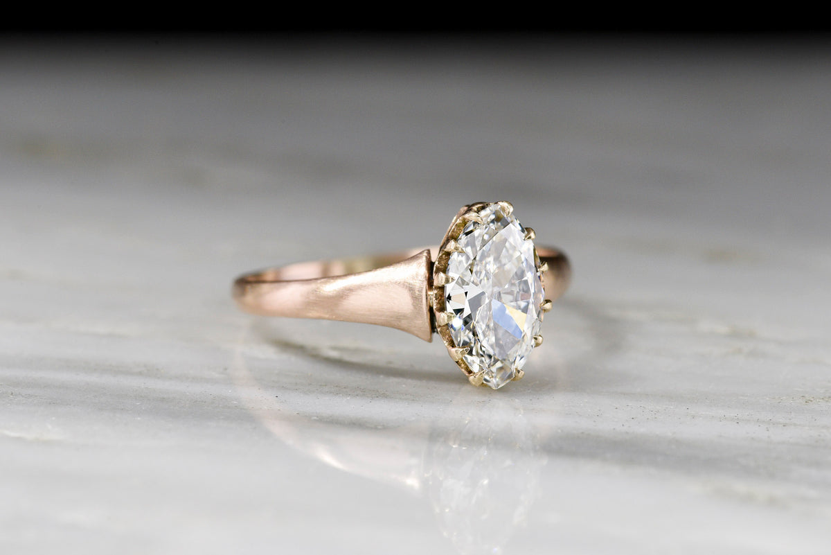 c. Early 1900s Rose Gold Engagement Ring with a GIA Marquise Cut Diamond Center