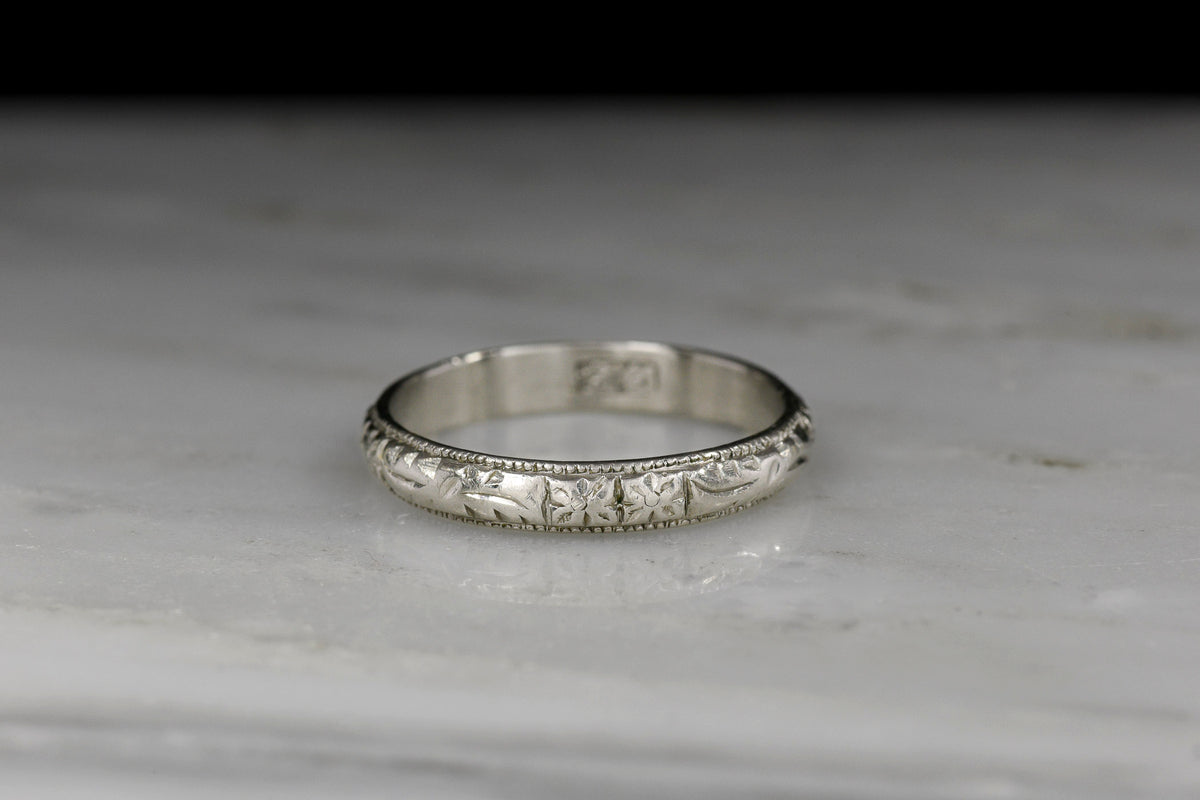 Vintage Platinum Band with an Orange Blossom Pattern and Chinese-Origin Stamps
