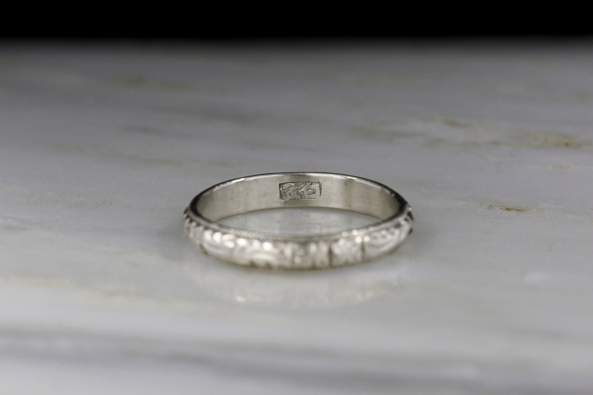 Vintage Platinum Band with an Orange Blossom Pattern and Chinese-Origin Stamps