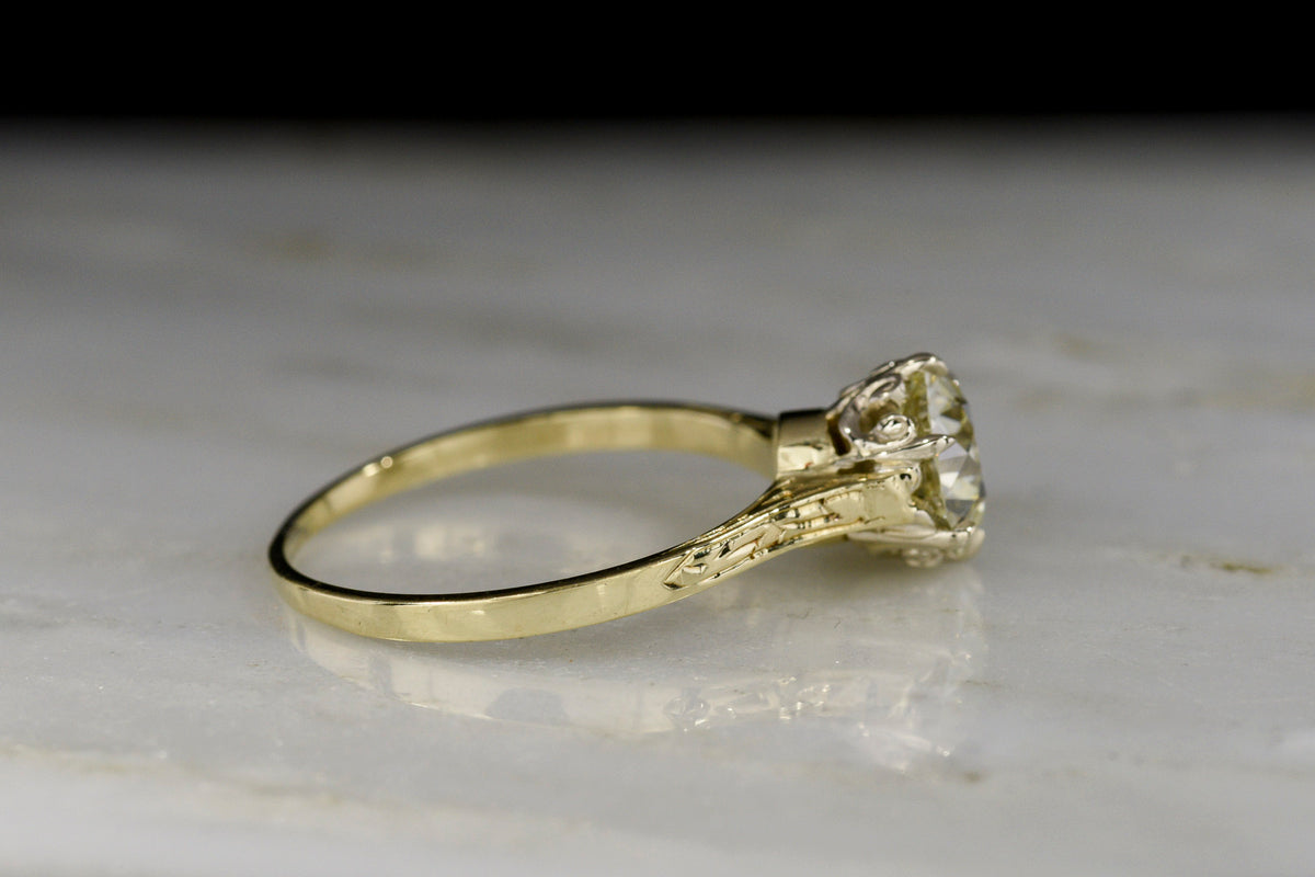 c. Early 1900s Yellow and White Gold Solitaire Engagement Ring with a Fleur de Lis Basket