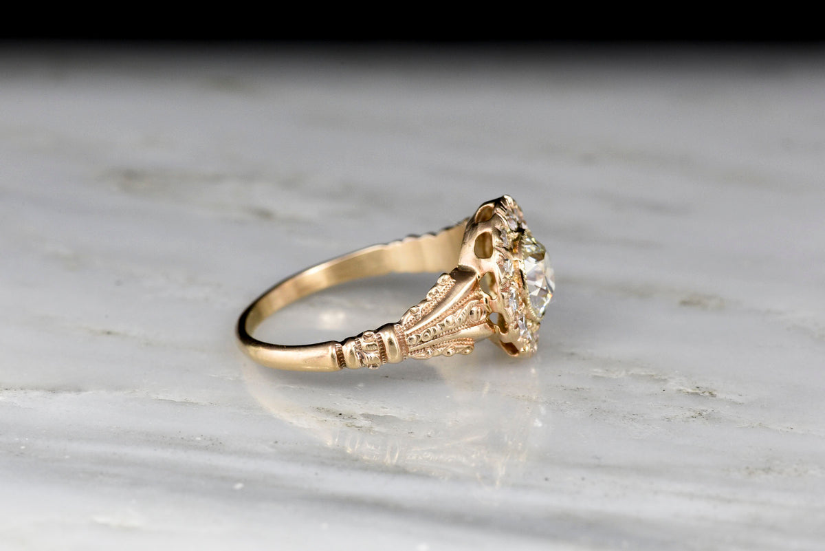 Late Victorian Halo Ring with an Old European Cut Diamond Center