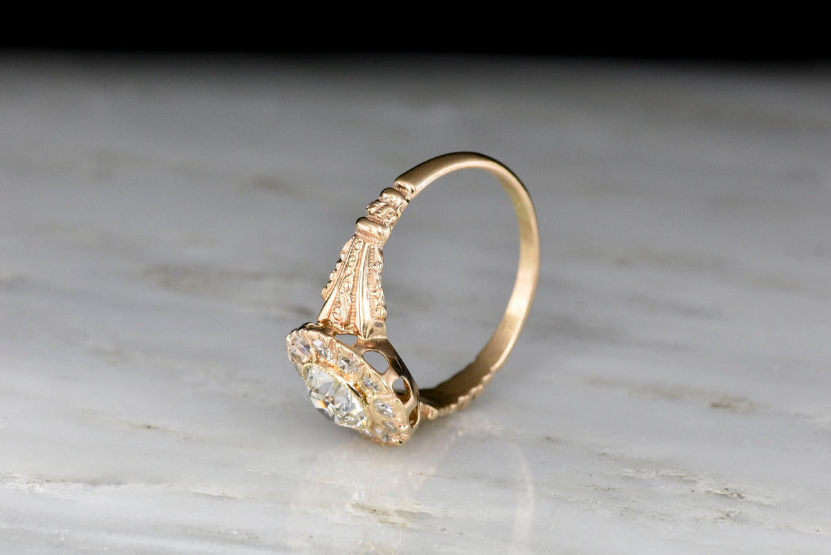 Late Victorian Halo Ring with an Old European Cut Diamond Center