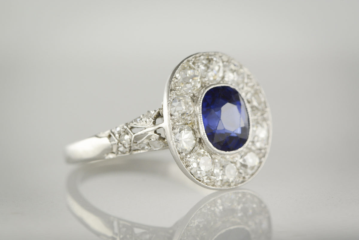 Art Deco Anniversary or Engagement Ring; 1.80 Carat Oval Cushion Cut Natural Sapphire with 2.00 ctw Old Mine and Antique Rose Cut Diamond Halo Accents