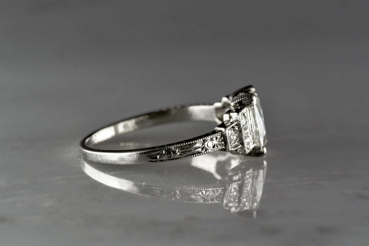 Rare 1.10 Carat French-Emerald Cut Diamond in a 1920s Art Deco Diamond and Platinum Engagement Ring with Hand Engraving