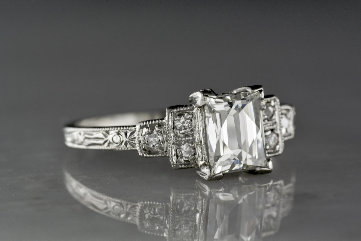 Rare 1.10 Carat French-Emerald Cut Diamond in a 1920s Art Deco Diamond and Platinum Engagement Ring with Hand Engraving