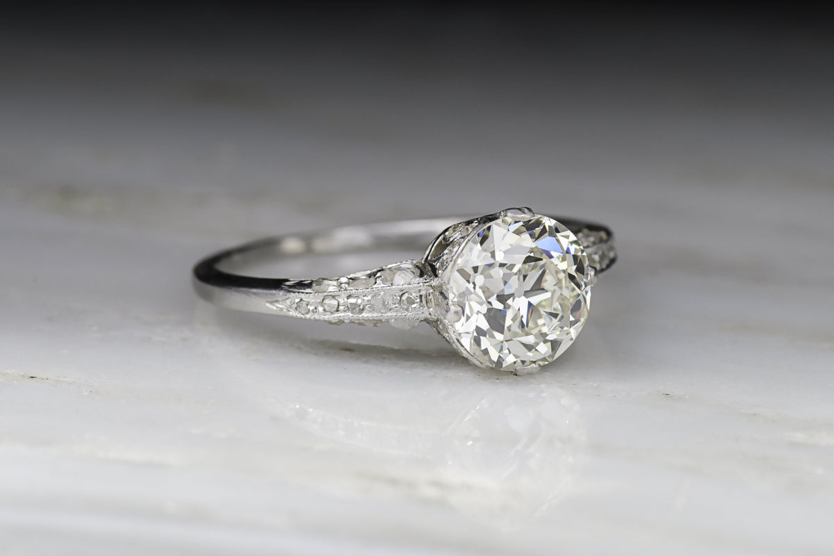 Antique Edwardian Engagement Ring with 1.35 Carat Old European Cut Diamond Center in a Hand-Engraved Solitaire Mount