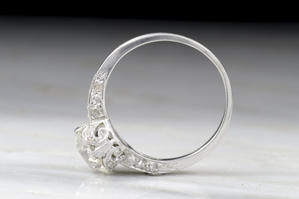 Antique Edwardian Engagement Ring with 1.35 Carat Old European Cut Diamond Center in a Hand-Engraved Solitaire Mount