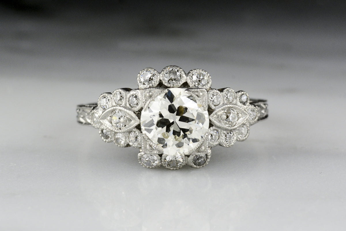 Early Art Deco Old European Cut Diamond Engagement Ring with Geometric Detailings