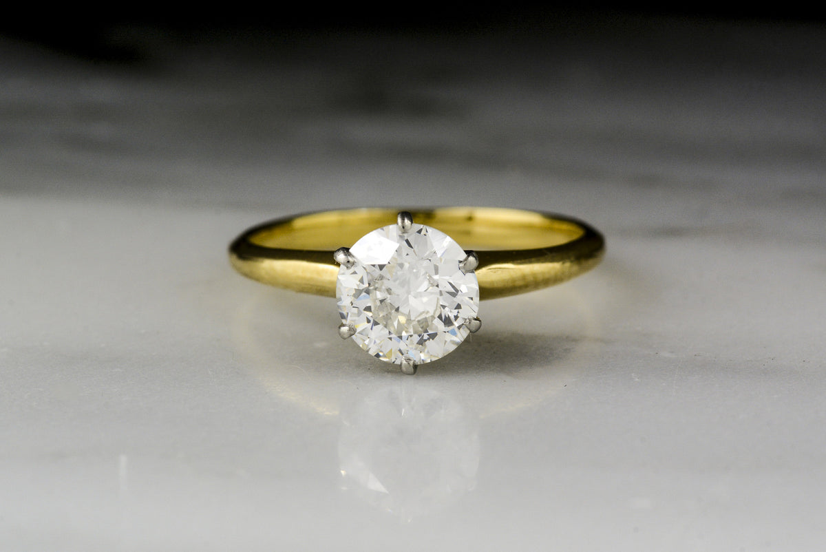 Vintage Tiffany &amp; Co. Platinum and 18K Yellow Gold Solitaire Engagement Ring with a GIA Certified .95 Carat Old European Cut Diamond