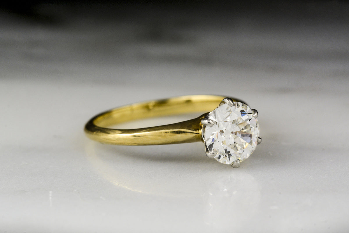 Vintage Tiffany &amp; Co. Platinum and 18K Yellow Gold Solitaire Engagement Ring with a GIA Certified .95 Carat Old European Cut Diamond