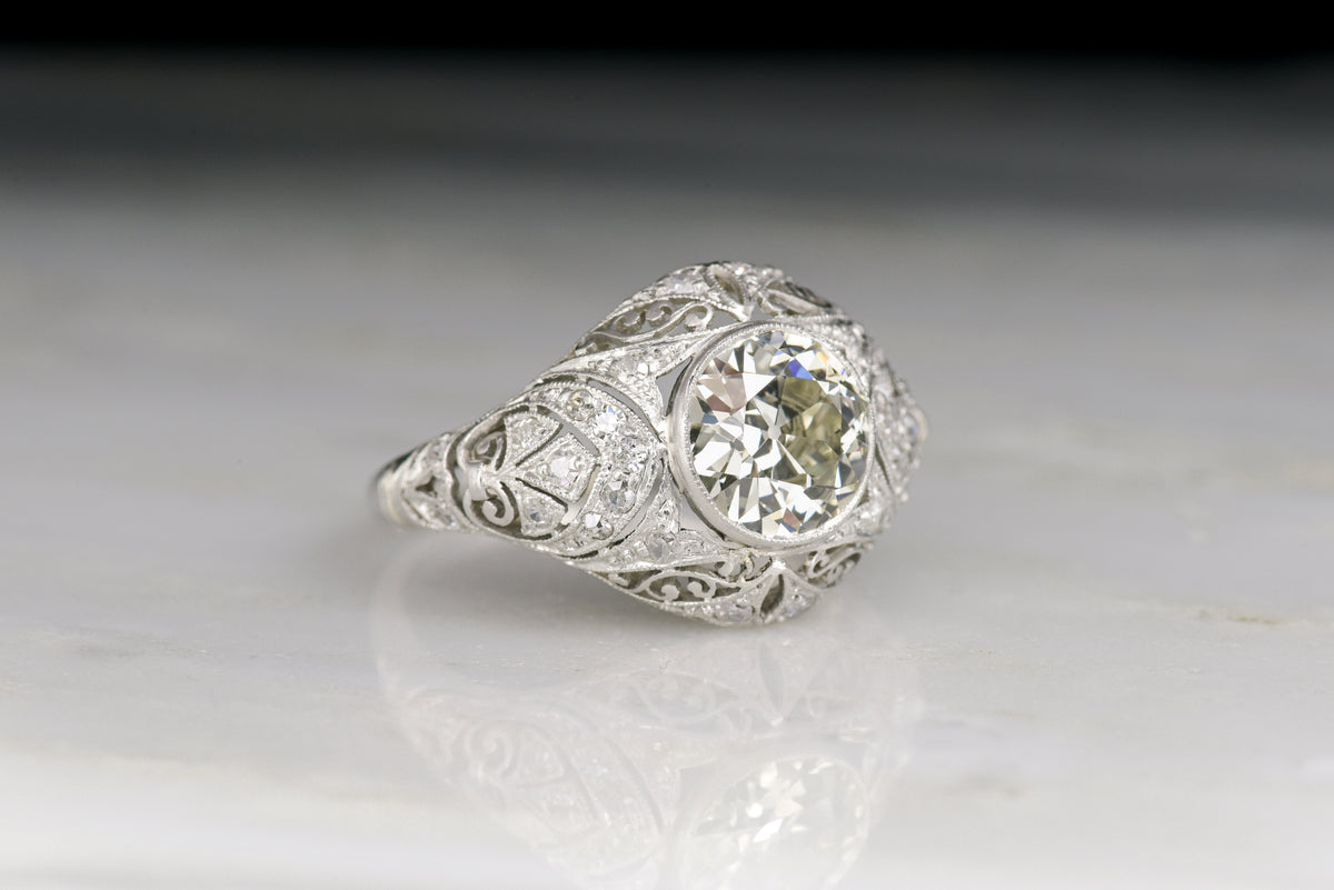 Ornate Hand-Pierced Edwardian Ring with a Late Old European Cut Diamond Center