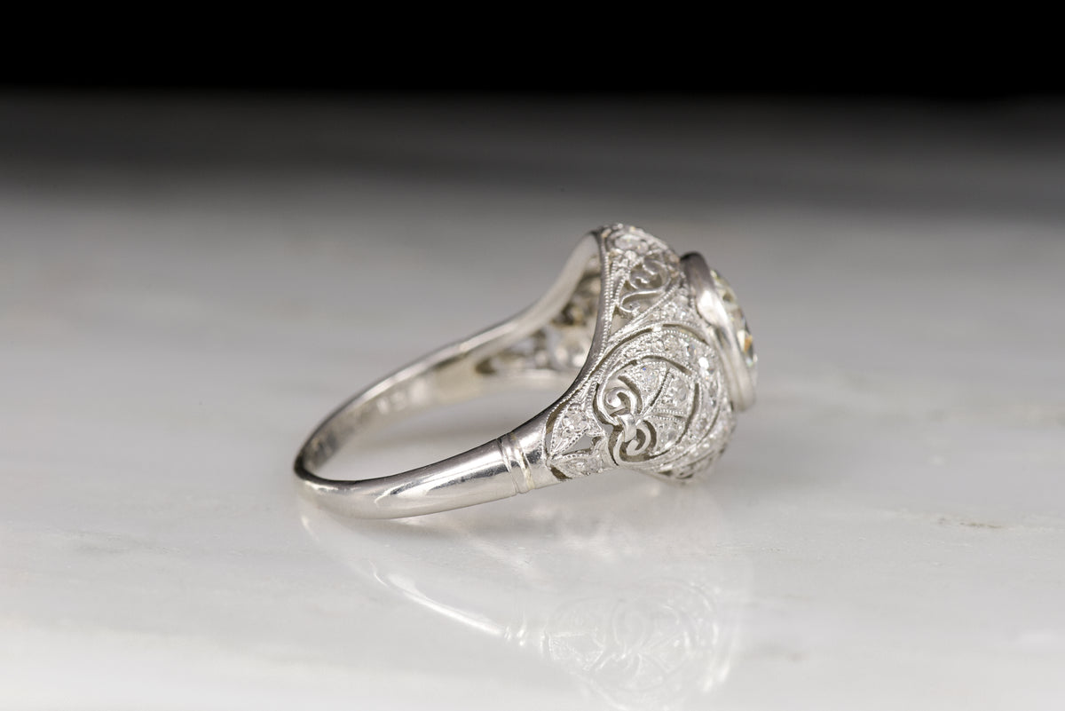 Ornate Hand-Pierced Edwardian Ring with a Late Old European Cut Diamond Center