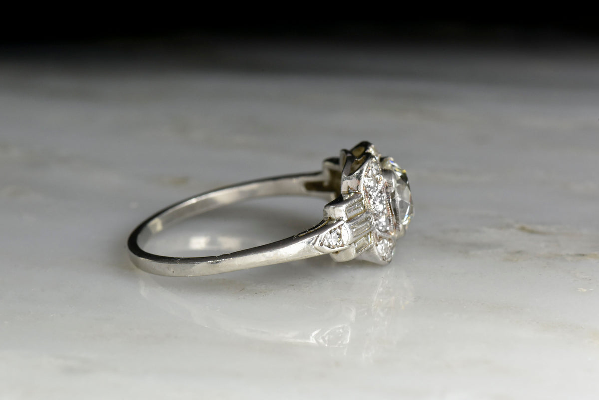 Late Art Deco Engagement Ring with Baguette Cut Shoulders