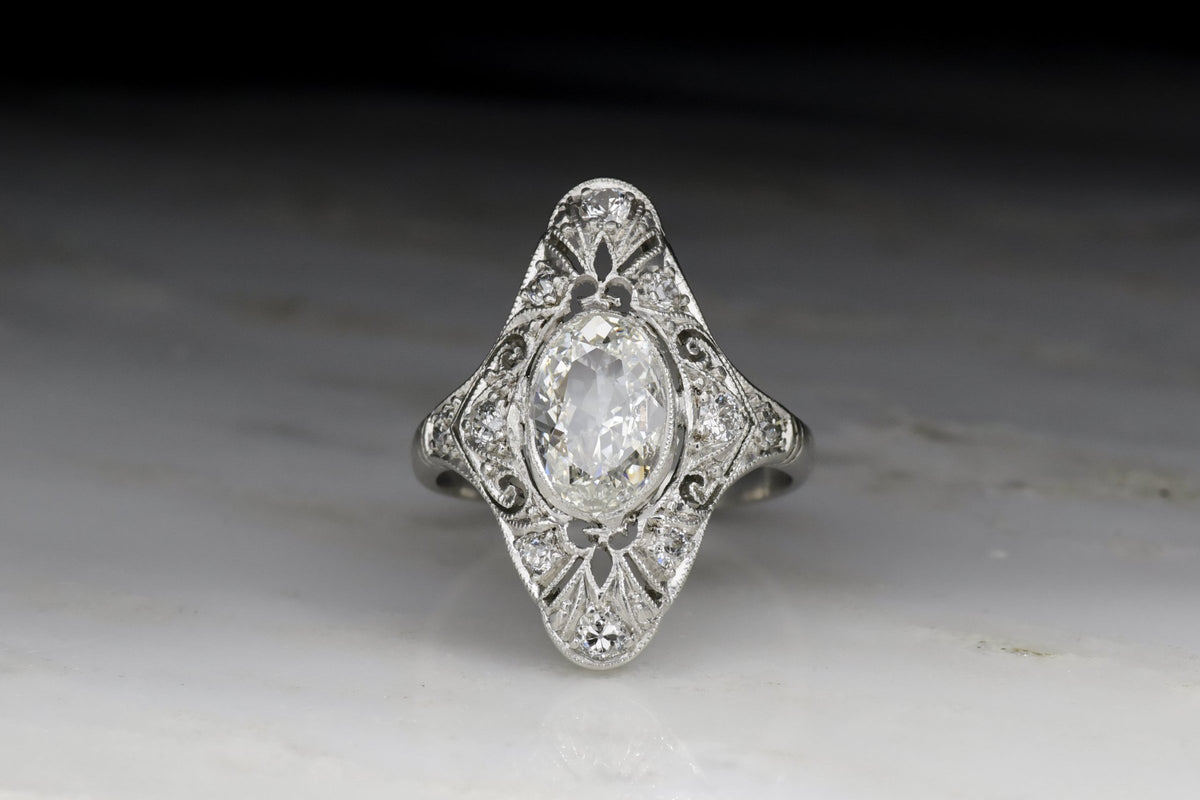 Antique Edwardian, Art Deco Women&#39;s Diamond Ring with Ornate Open Filigree and Oval Cut Diamond Center