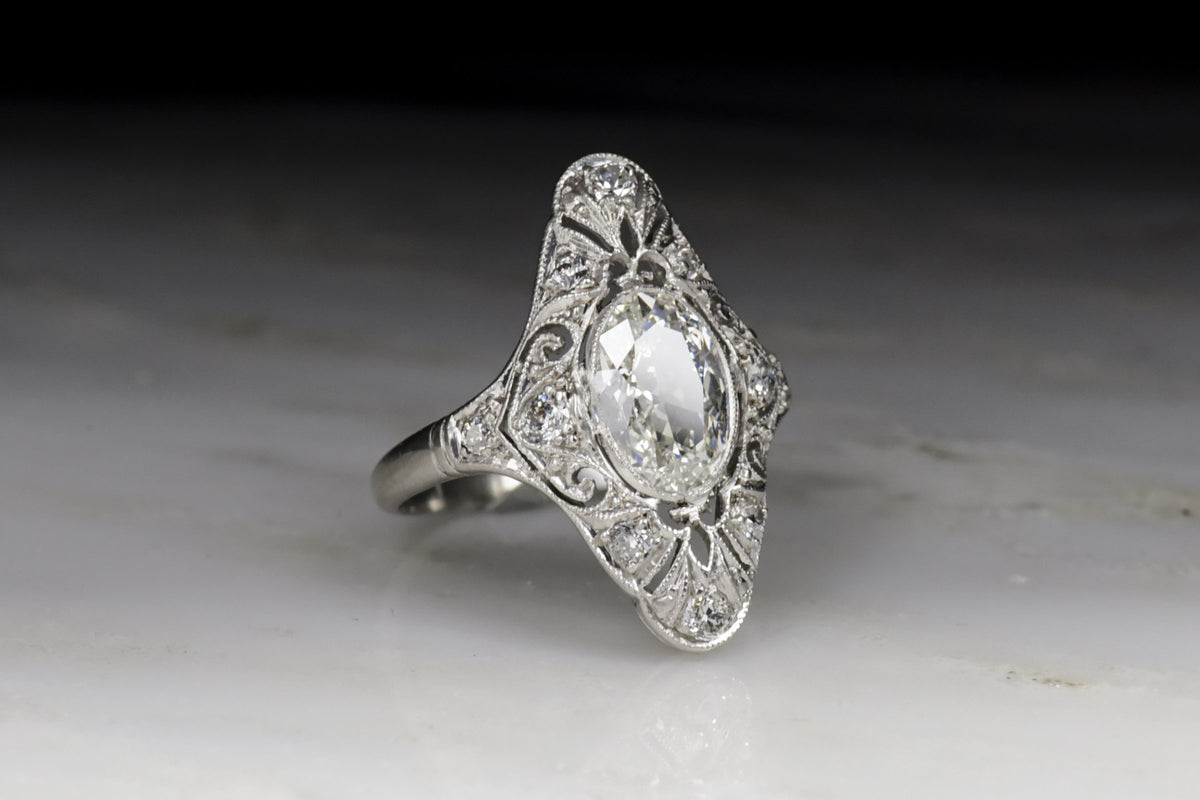 Antique Edwardian, Art Deco Women&#39;s Diamond Ring with Ornate Open Filigree and Oval Cut Diamond Center