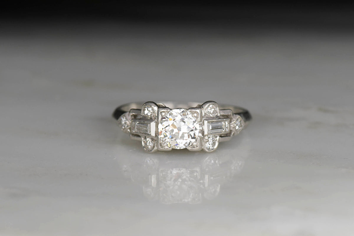 Late Art Deco Engagement Ring with a Geometric Baguette Cut Shoulder Design