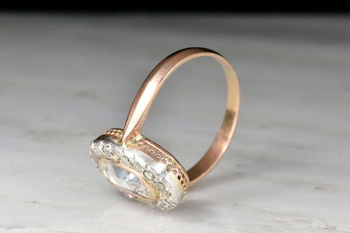 Victorian Rose Gold and Silver Ring with a GIA 1.01 Carat Oval Rose Cut Diamond