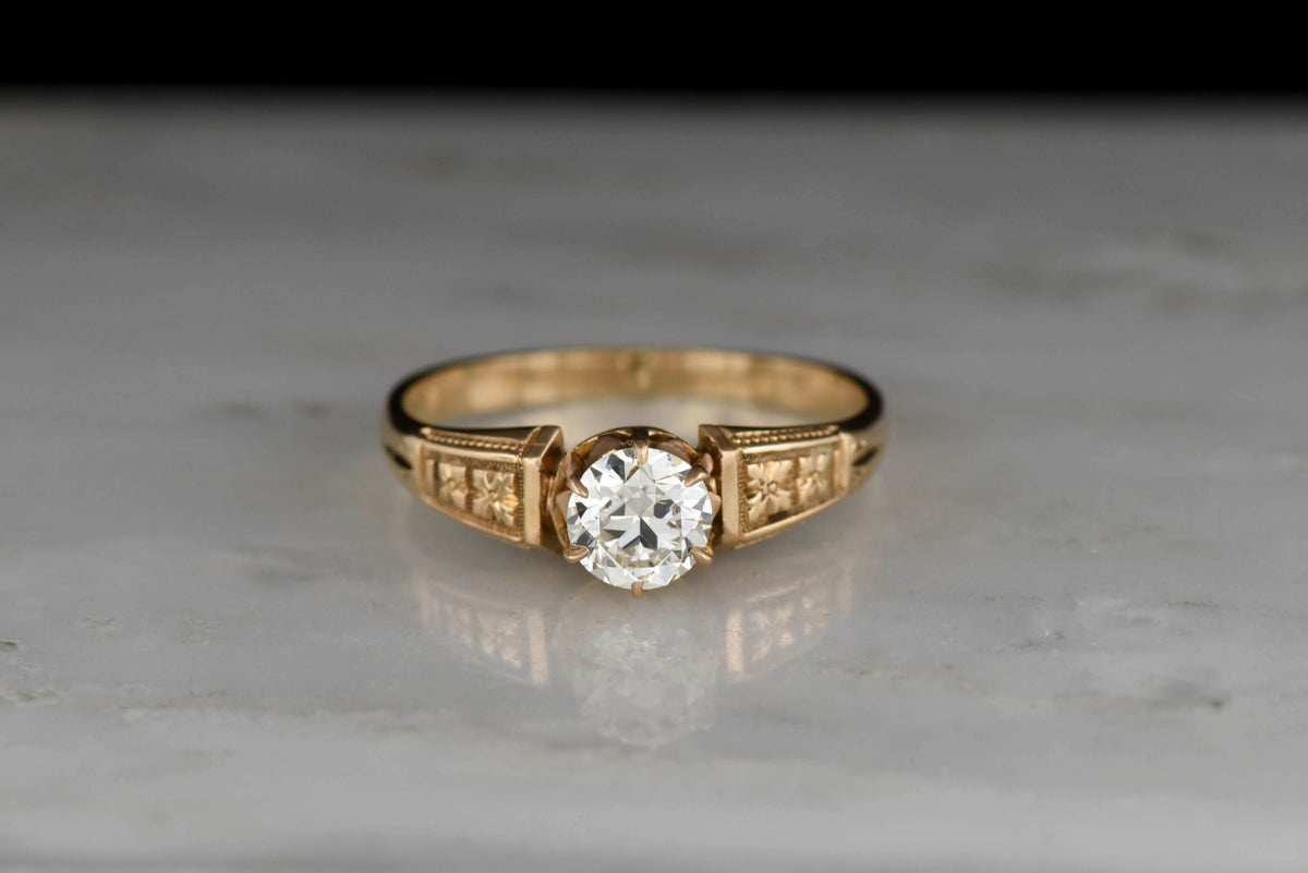 Late Victorian Solitaire with Floral Relief Shoulders