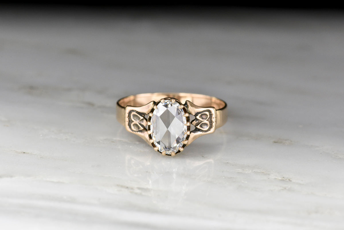 Victorian Multi-Prong Engagement Ring with a GIA Oval Rose Cut Diamond Center
