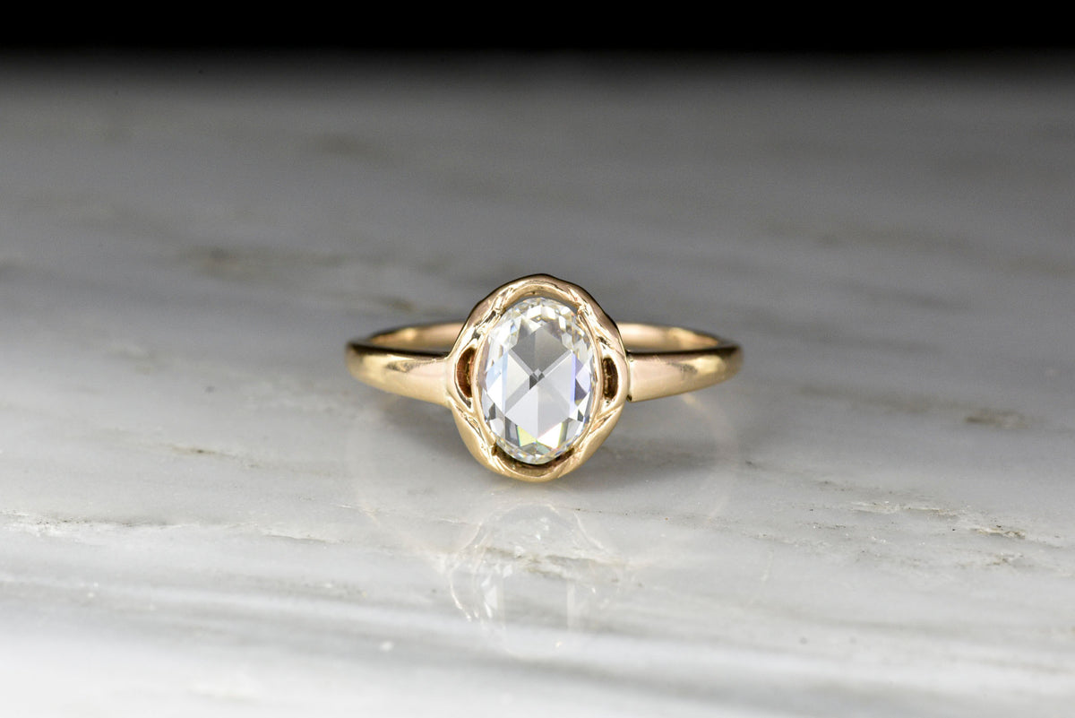 Late Victorian Gold Solitaire Engagement Ring with a 1.03 Carat Oval Rose Cut Diamond