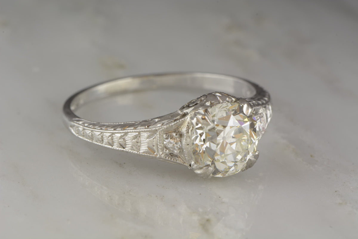 1.30ct Platinum Edwardian / Early Art Deco Old European Cut Diamond Engagement Ring with Single Cut Diamond Accents