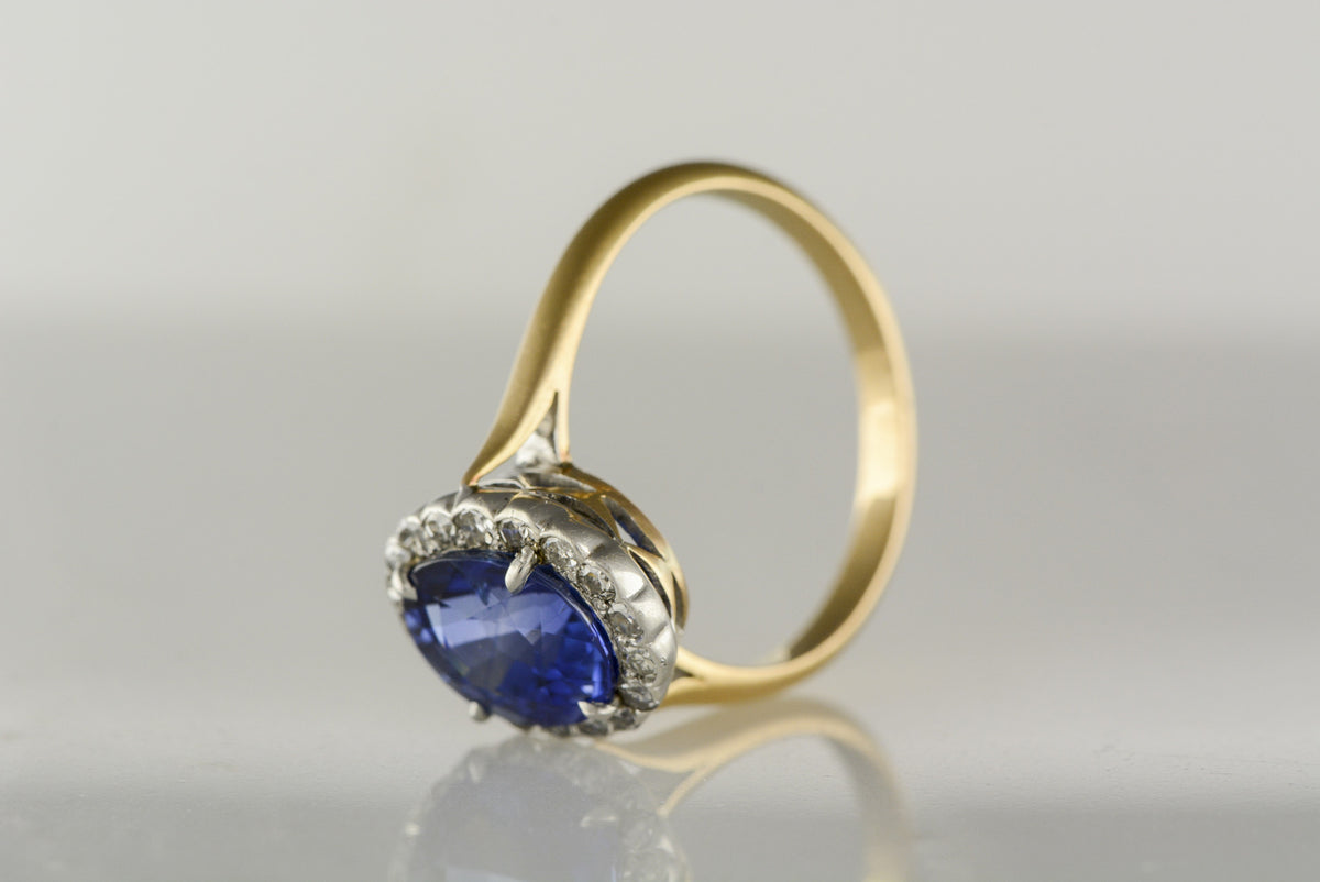 Antique Victorian Diamond Halo, Gold and Platinum Engagement Ring with 3.65 Carat Oval Brilliant Cut Sapphire Center
