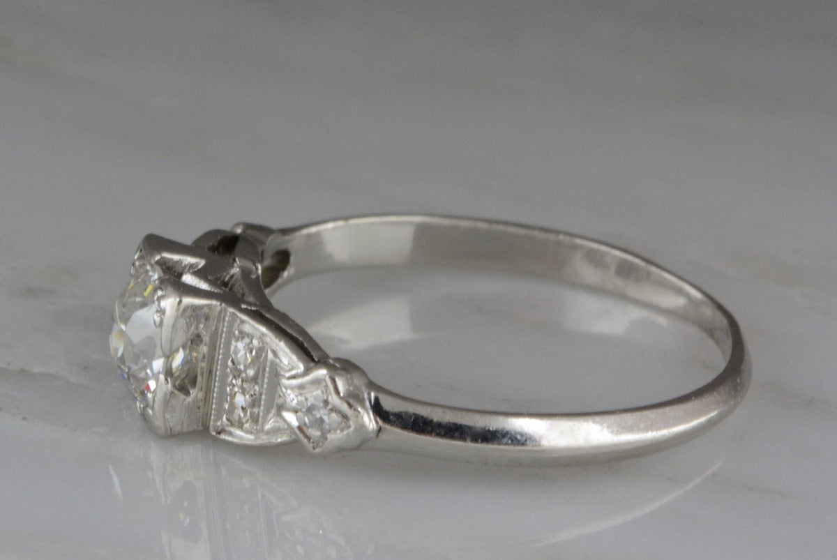 .77ctw Edwardian / Art Deco .65ct Old European Cut Diamond and Platinum Engagement Ring with .12ctw Diamond Accents