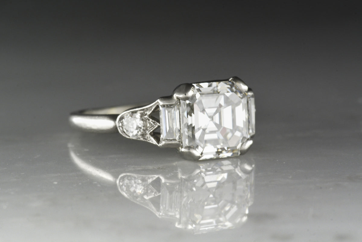 GIA Certified 2.25 Carat Asscher Cut Diamond in an Antique Platinum and Diamond Art Deco Engagement Ring
