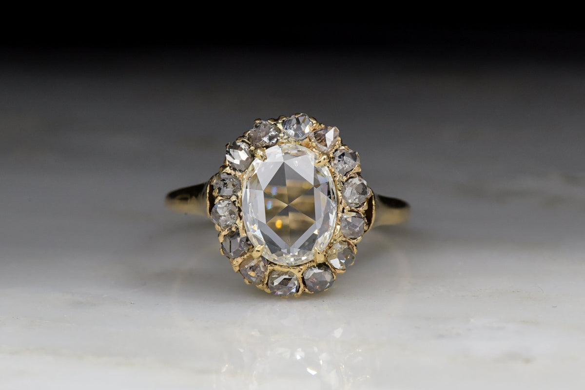 Antique Victorian .95 Carat Oval Rose Cut Diamond Cluster Engagement Ring