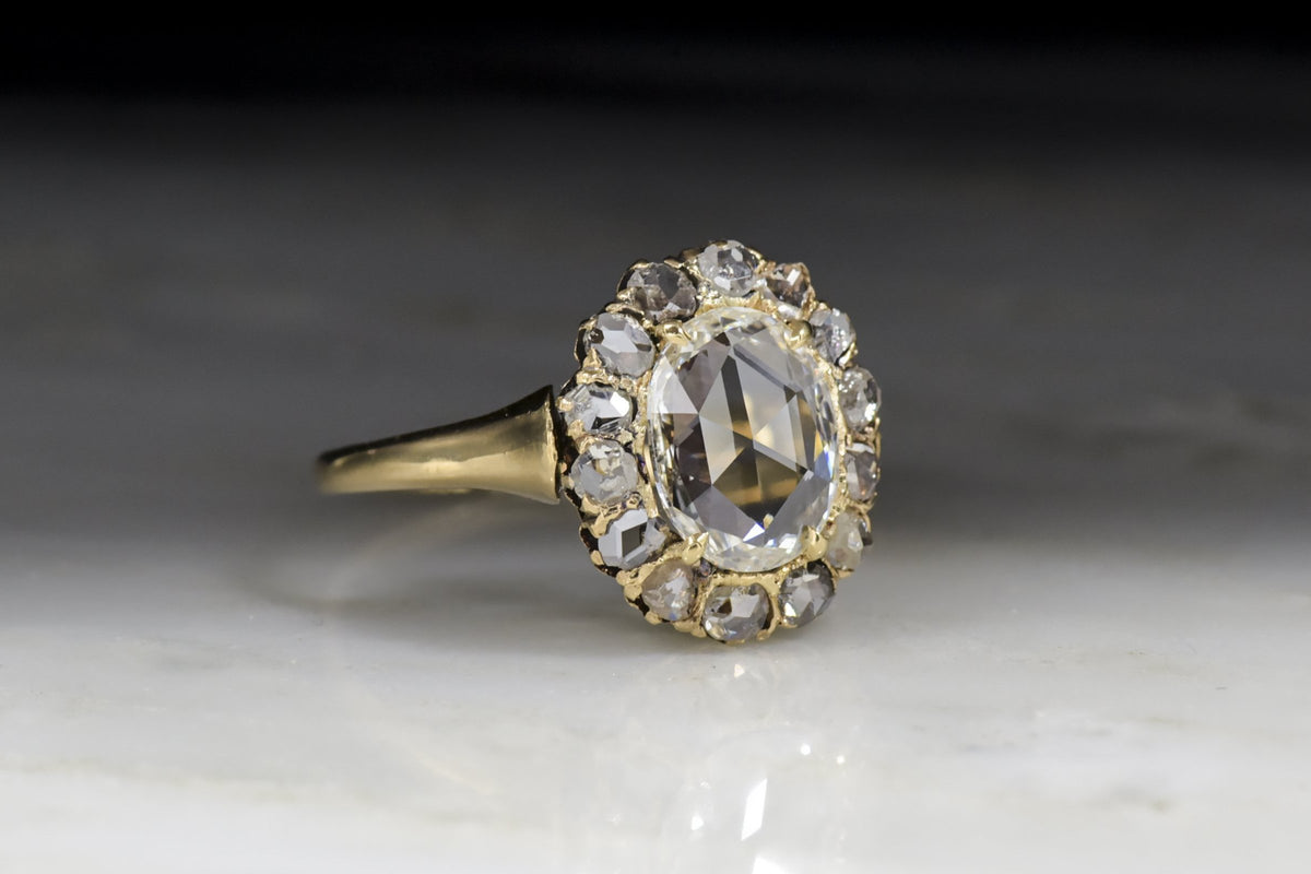 Antique Victorian .95 Carat Oval Rose Cut Diamond Cluster Engagement Ring