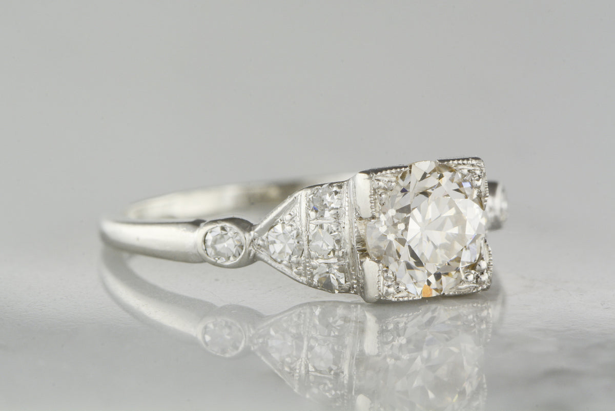 Antique .85 Carat Old European Cut Diamond in c. 1920 Art Deco / Late-Edwardian Platinum Engagement Ring with .35 Carats Diamond Accents (1.20 ctw)