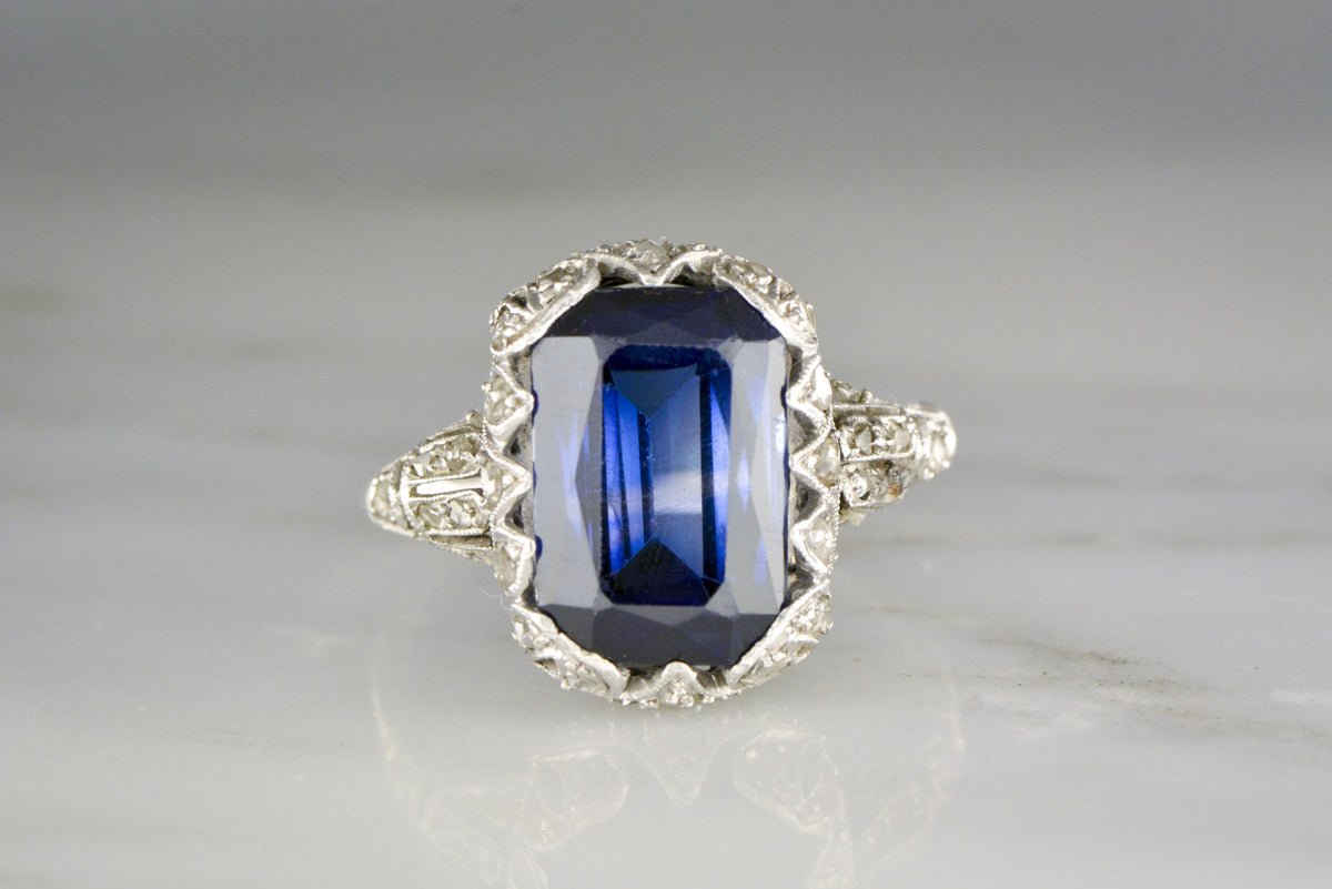 French Edwardian Platinum Ring with an Emerald/Scissor Cut Created Sapphire and .50 ctw Rose Cut Diamonds