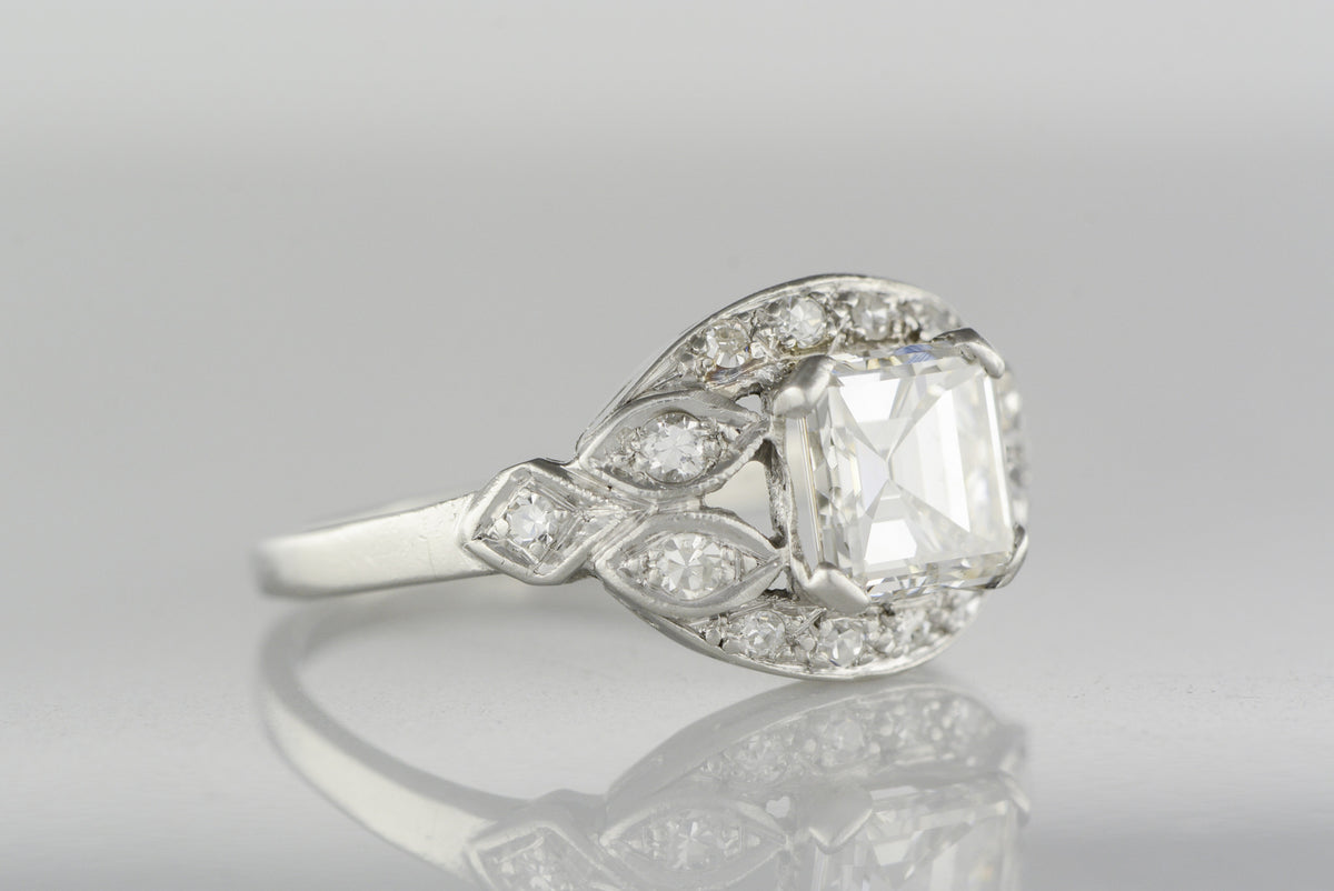 1.18 Carat GIA Certified Asscher Cut Diamond in an Early 1920s Art Deco Platinum Engagement Ring with Diamond Accents