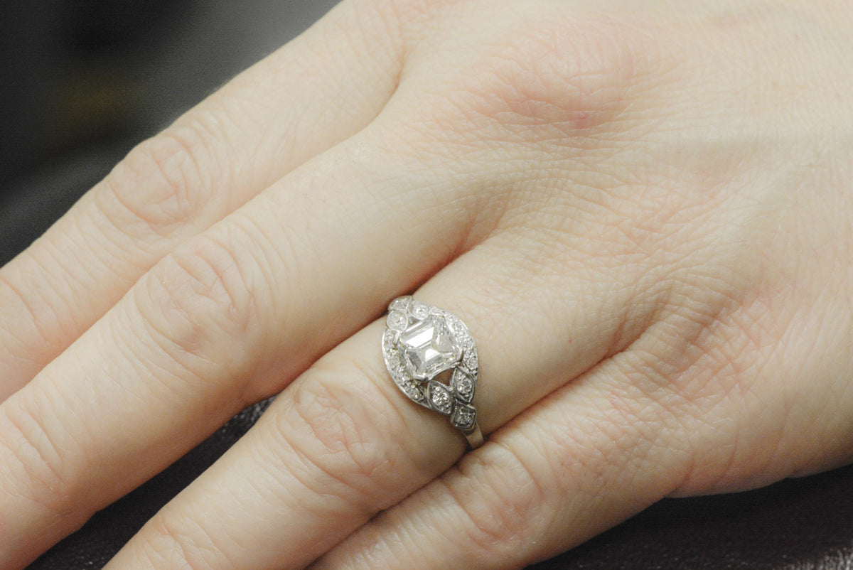 1.18 Carat GIA Certified Asscher Cut Diamond in an Early 1920s Art Deco Platinum Engagement Ring with Diamond Accents