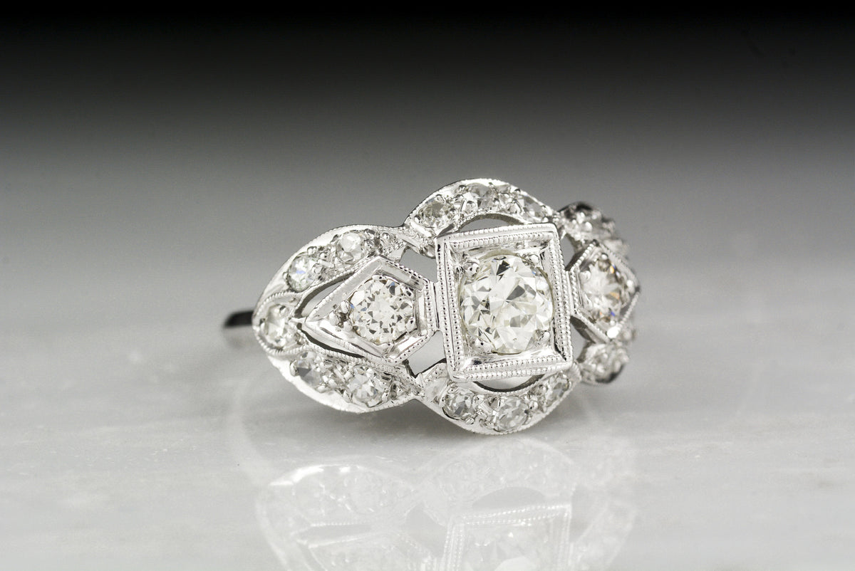 Antique Old European Cut Diamond and Platinum Cocktail Engagement Ring with Single Cut Diamond Accents