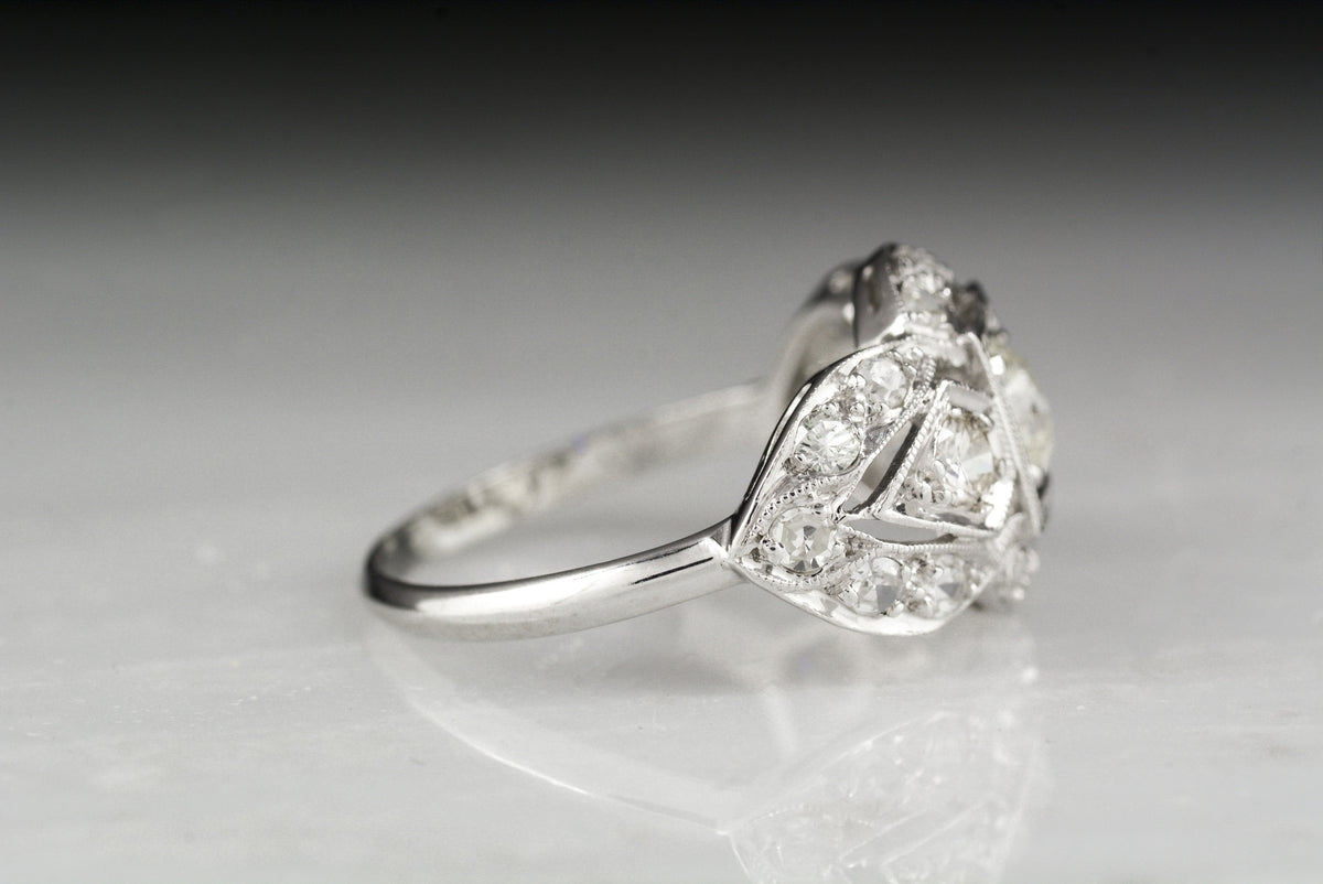 Antique Old European Cut Diamond and Platinum Cocktail Engagement Ring with Single Cut Diamond Accents
