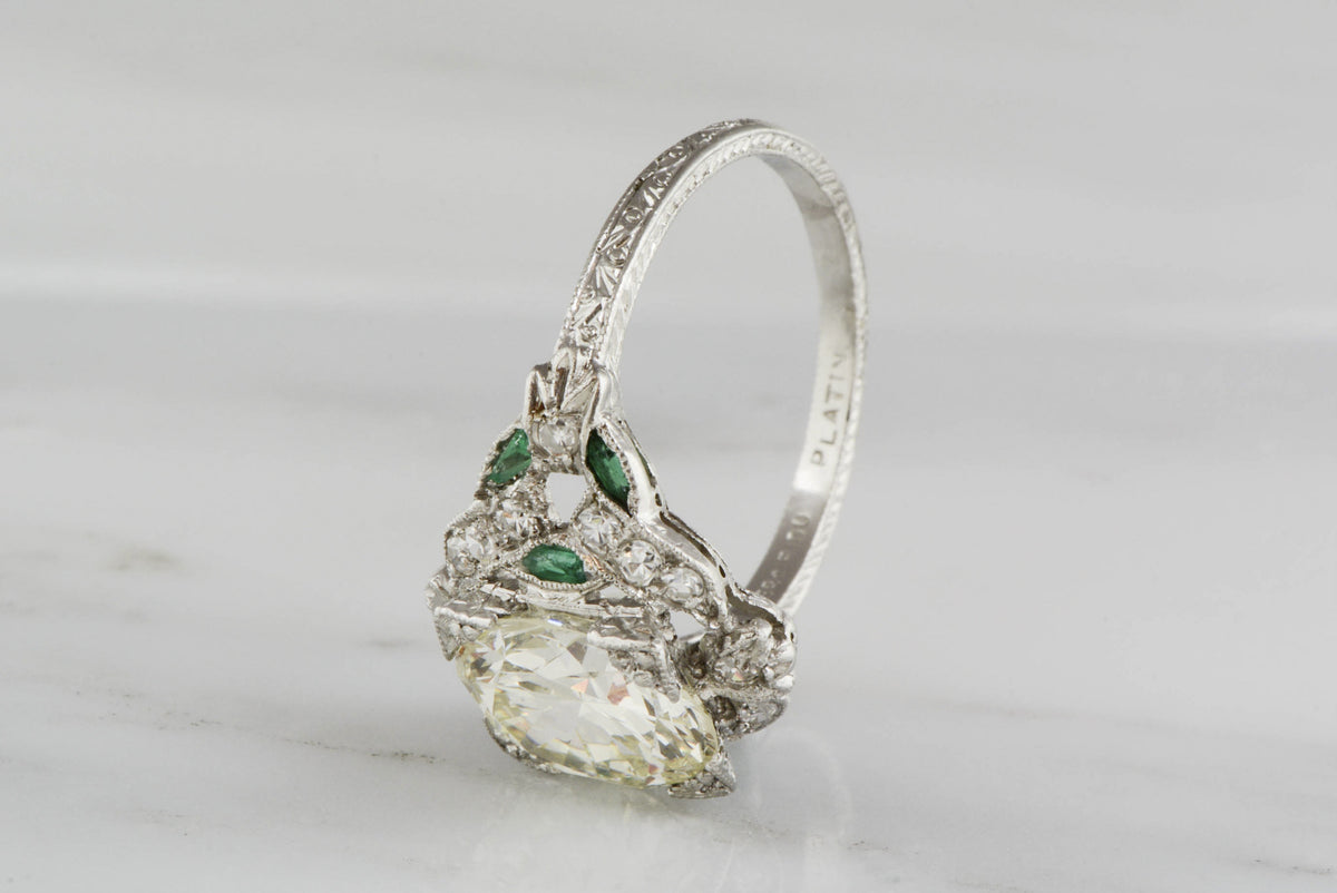 2.85 Carat Old European Cut Diamond (3.60 ctw) and Platinum Edwardian Engagement Ring; .50 ctw Single Cut Diamonds and .25 ctw Emeralds