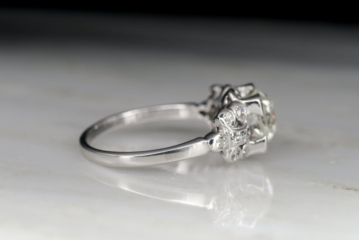 Edwardian / Early Art Deco Engagement Ring with an Old Mine Cushion Cut Diamond Center