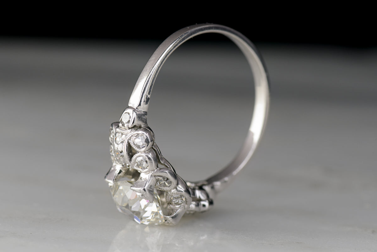 Edwardian / Early Art Deco Engagement Ring with an Old Mine Cushion Cut Diamond Center
