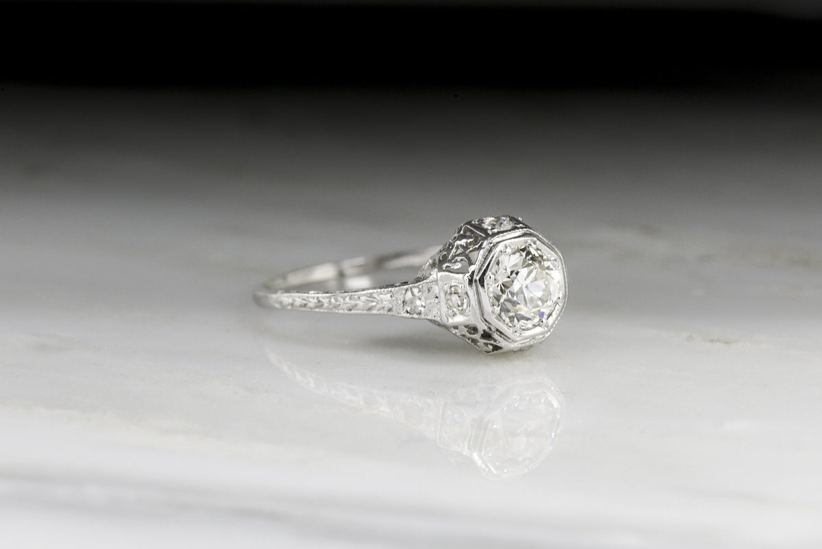 Antique Late Edwardian Engagement Ring with Open Filigree and an Old European Cut Diamond Center