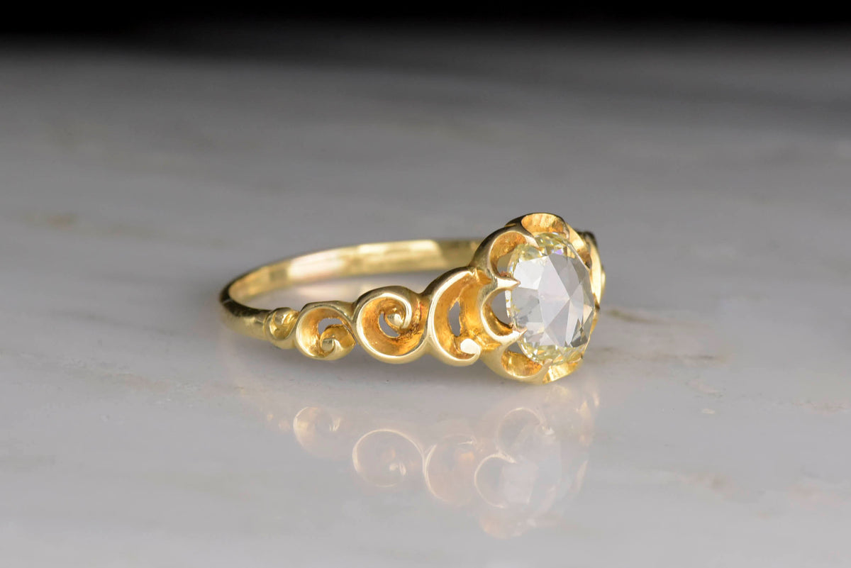 Victorian / Art Nouveau 18K Gold Ring with an Oval Rose Cut Diamond Center