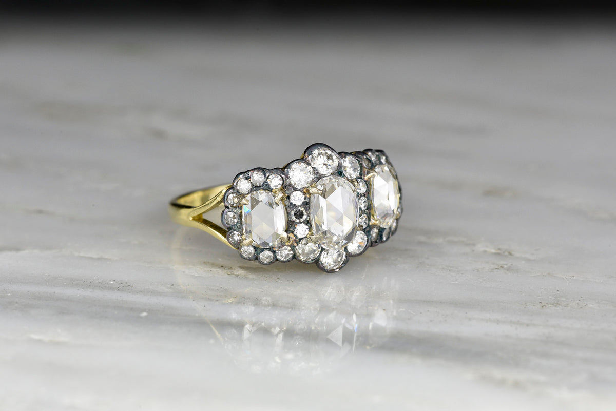 Victorian Three-Stone Ring with Oval Rose Cut Diamond Centers and Mixed-Cut Diamond Accents