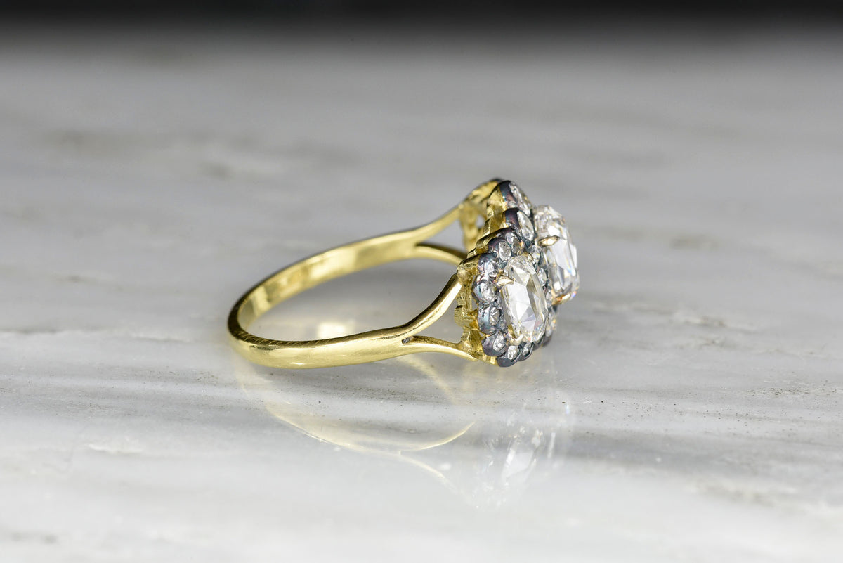 Victorian Three-Stone Ring with Oval Rose Cut Diamond Centers and Mixed-Cut Diamond Accents