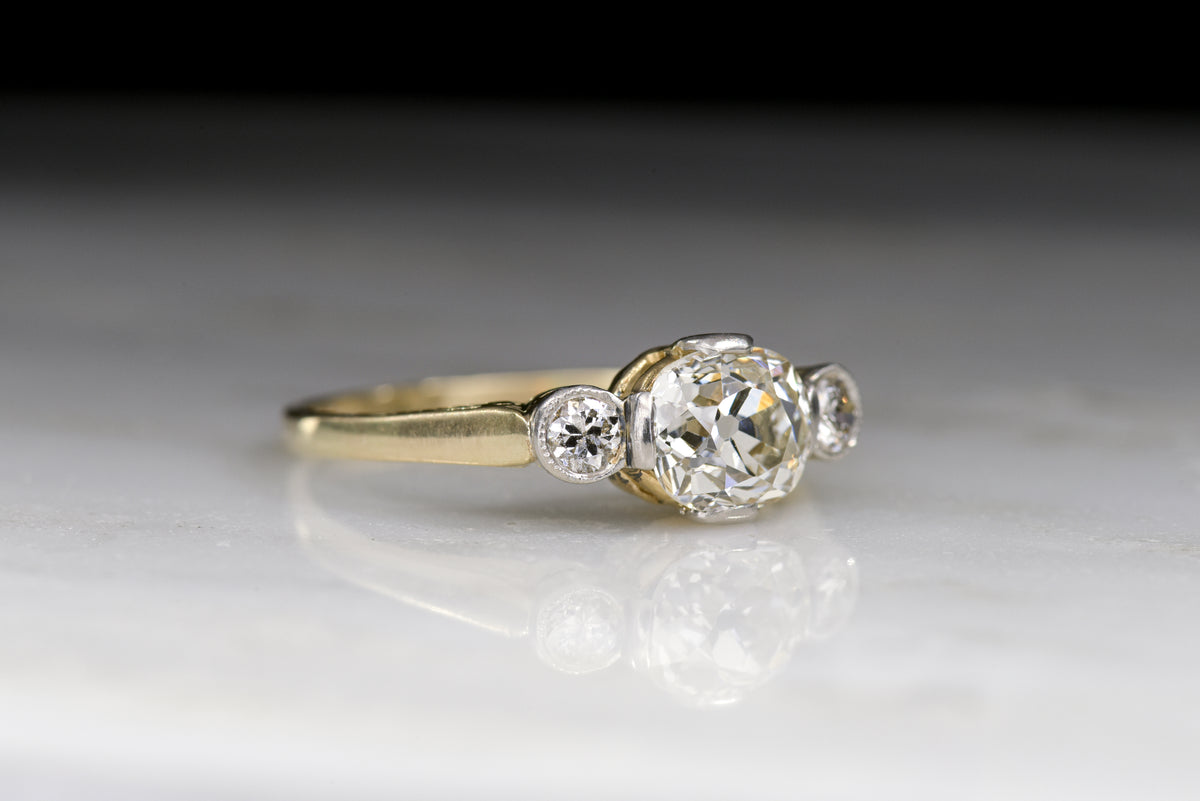 Victorian Three-Stone Engagement Ring with a .97 Carat GIA Certified Old Mine Cushion Cut Diamond