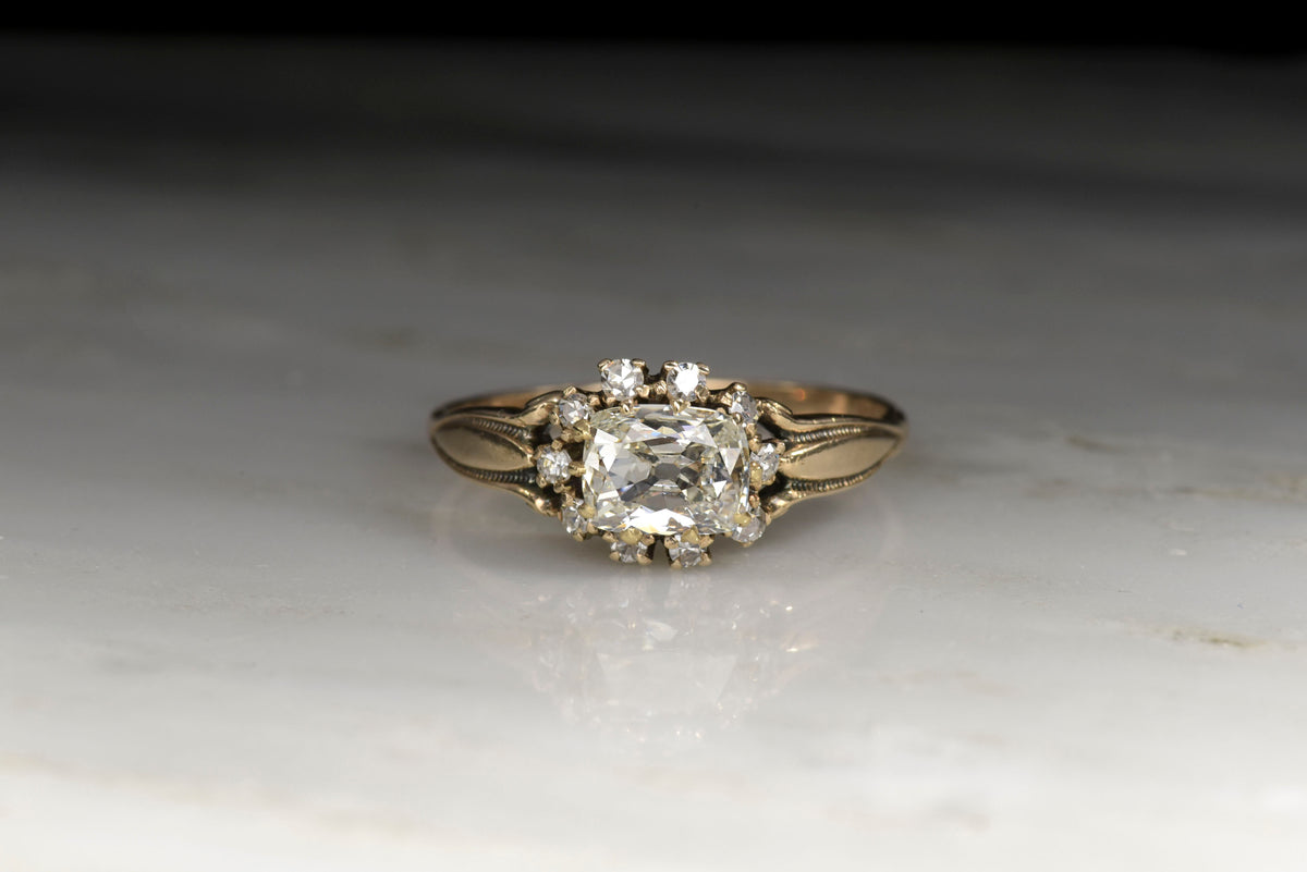 Victorian Gold Engagement Ring with a .73 Carat Rectangular Cushion Cut Diamond Center