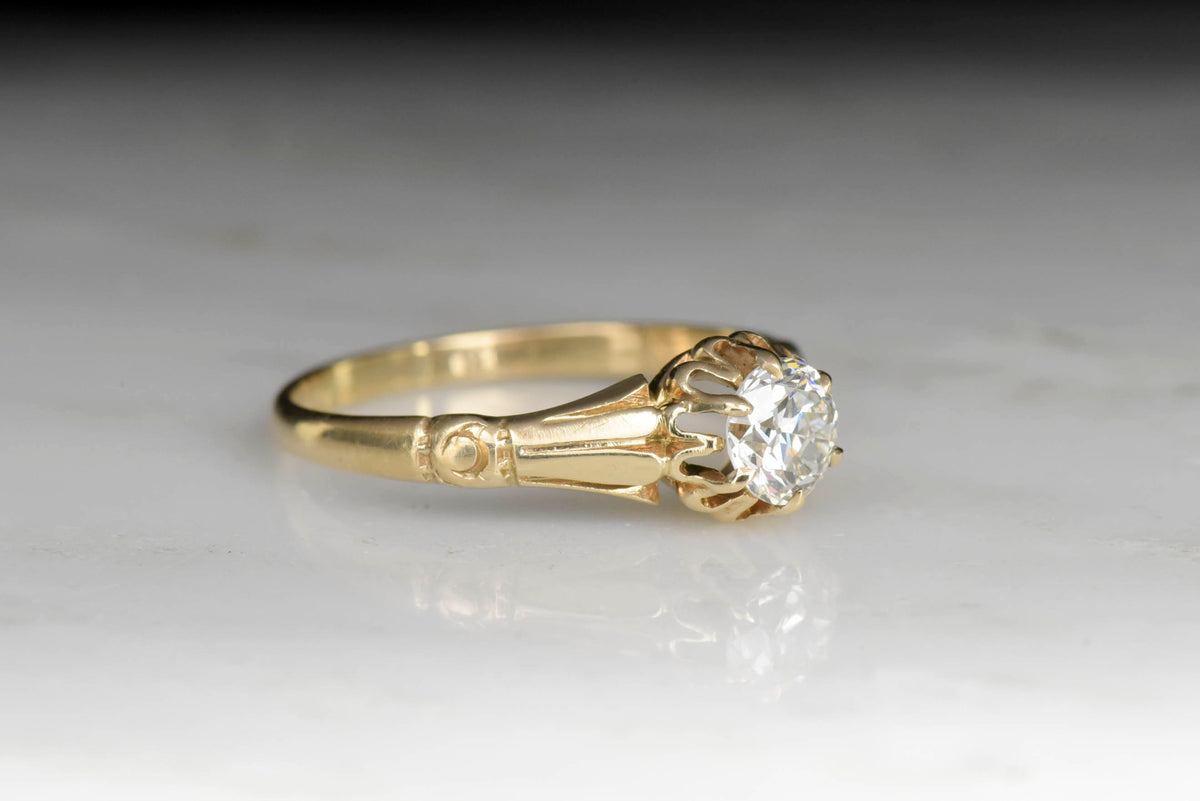 Victorian Épaulette and Buttercup Engagement Ring