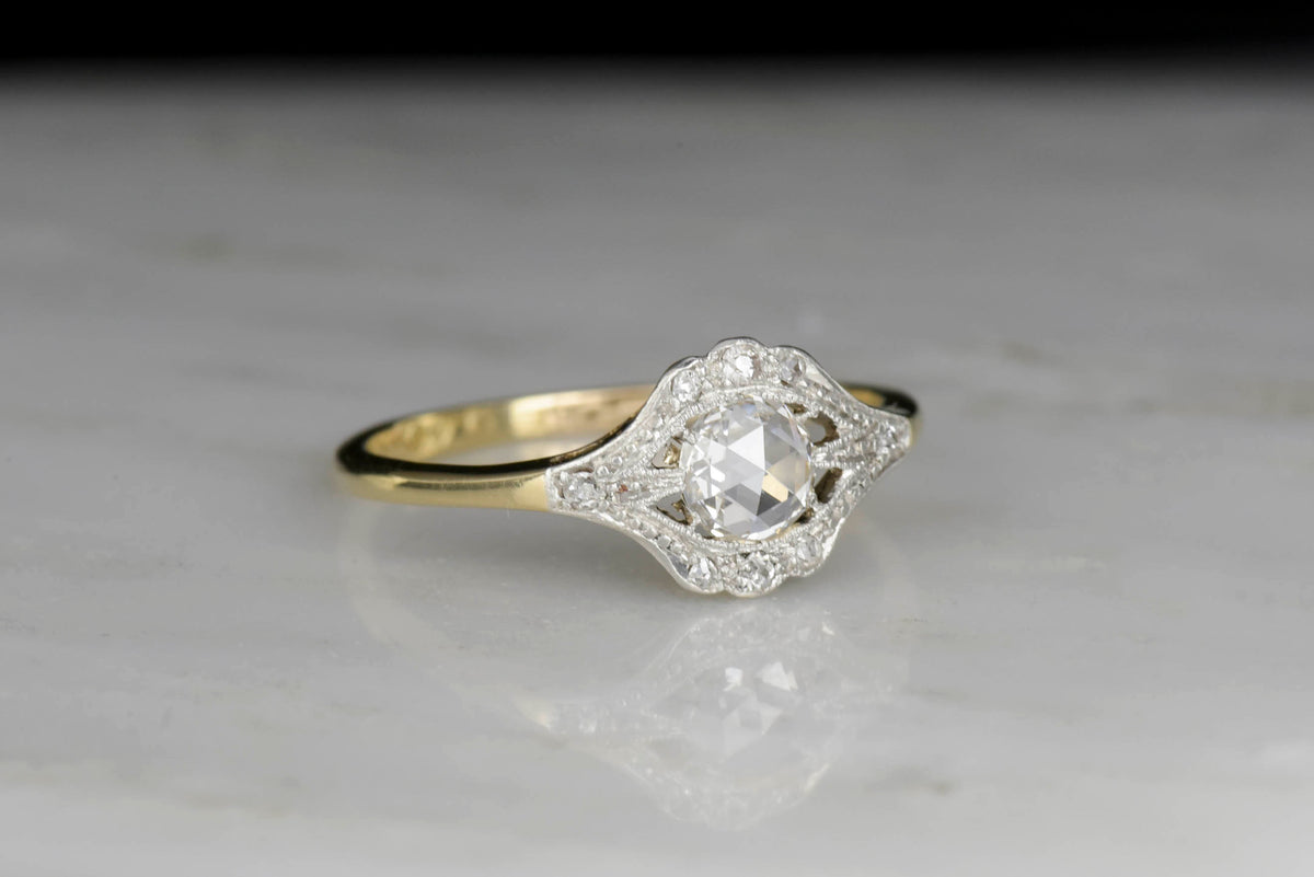 Belle Époque Gold and Platinum Ring with a Rose Cut Diamond Center